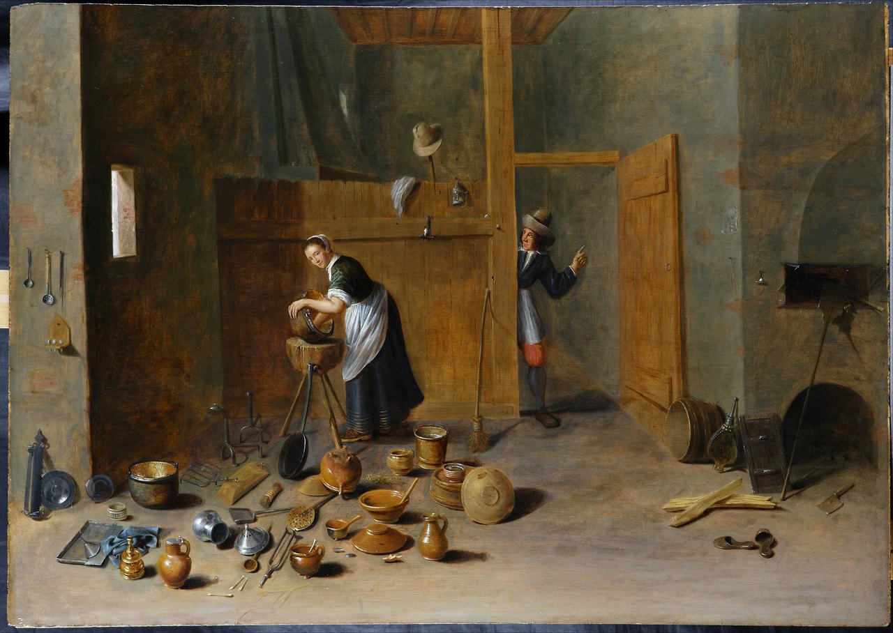 A Dutch painting of a bare scullery, its floor and table crowded with copper pots, pans and jugs, a maid scouring at a tub while a boy stands in the doorway