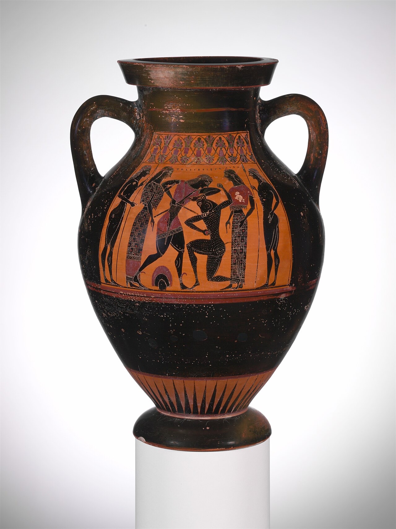 A two-handled Greek amphora, black glaze over orange clay; the painted panel shows a hero driving a sword into a kneeling bull-headed man while robed onlookers watch