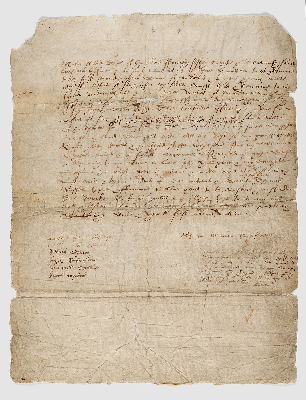 A creased, stained sheet of 1616 handwriting in brown ink: the final page of William Shakespeare's will, with witness signatures at lower left and his own signature at right